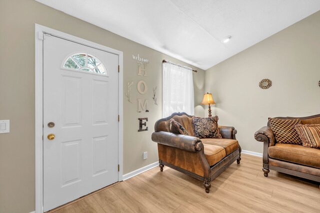4953 Clintonville Rd, Clarkston, MI 48346 - entrance foyer with light wood finished floors and baseboards