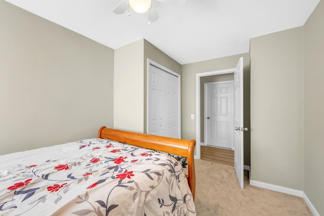 4953 Clintonville Rd, Clarkston, MI 48346 - bedroom with light colored carpet, a closet, baseboards, and a ceiling fan