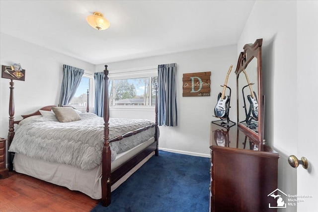 bedroom featuring baseboards