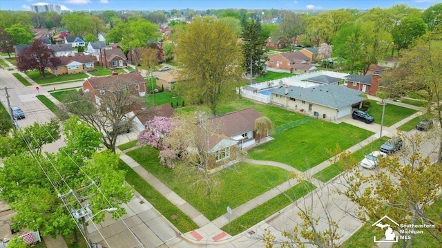 aerial overview of property's location with nearby suburban area