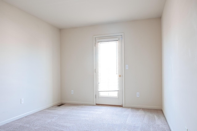 3050 Cloverly Ln, Ann Arbor, MI 48108 - spare room with light colored carpet and baseboards