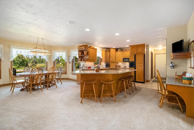 9695 36th St S, Scotts, MI 49088 - dining space with baseboards, light carpet, and recessed lighting