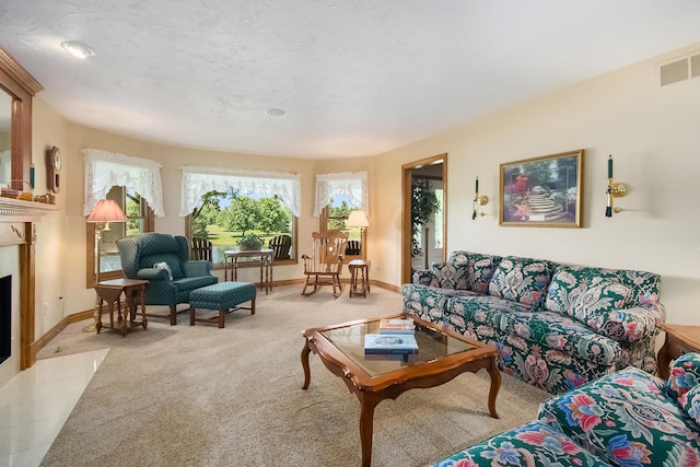 9695 36th St S, Scotts, MI 49088 - living room with a fireplace with flush hearth, carpet flooring, and baseboards