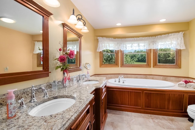 9695 36th St S, Scotts, MI 49088 - bathroom featuring a bath and double vanity
