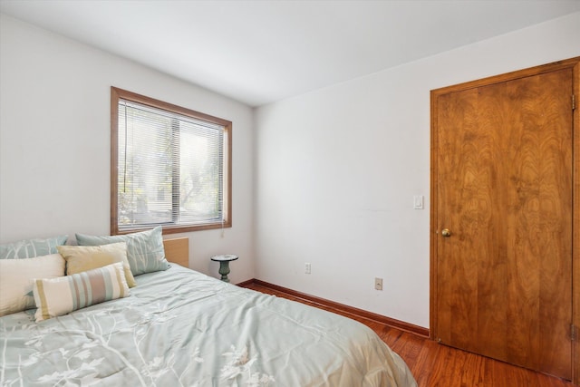 1975 Oldtown Ave, West Bloomfield, MI 48324 - bedroom with wood finished floors and baseboards