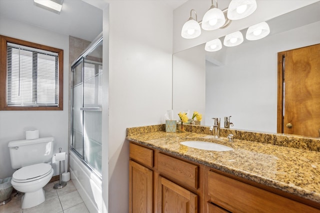 1975 Oldtown Ave, West Bloomfield, MI 48324 - full bathroom with tile patterned flooring, toilet, vanity, and combined bath / shower with glass door
