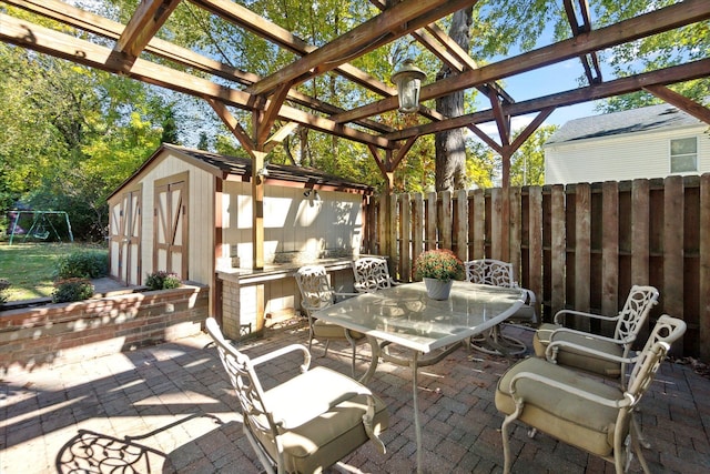 1975 Oldtown Ave, West Bloomfield, MI 48324 - view of patio / terrace featuring a storage shed, outdoor dining space, fence, an outbuilding, and a pergola