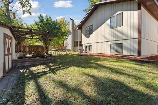 1975 Oldtown Ave, West Bloomfield, MI 48324 - view of yard featuring a pergola and central AC unit