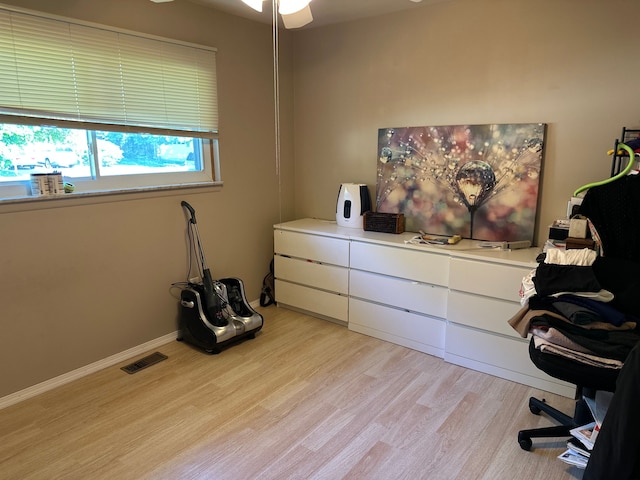 bedroom with light wood-style floors
