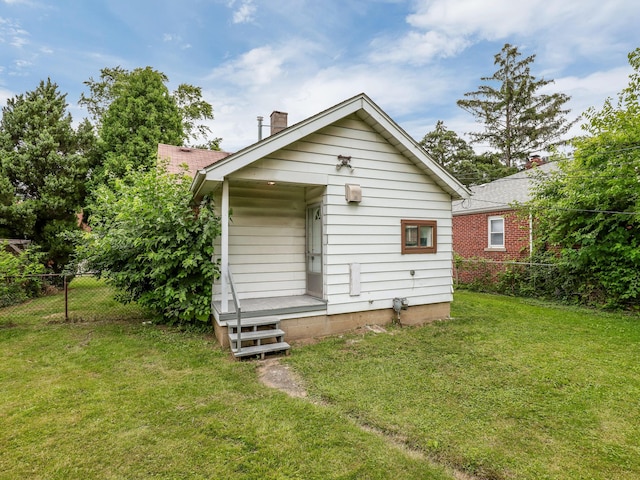 rear view of house with a chimney