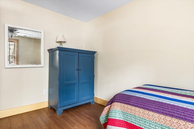 80220 Linden Hills St, Covert, MI 49043 - bedroom with dark wood-type flooring and baseboards