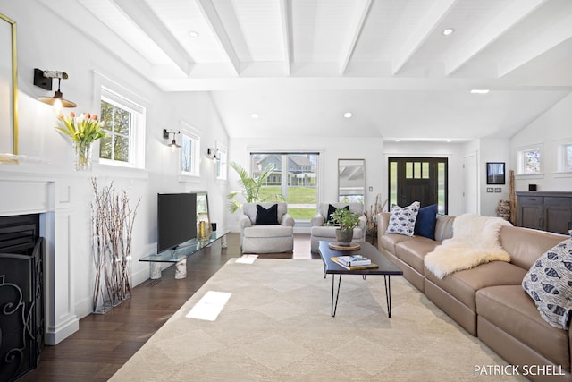 living area with a fireplace, wood finished floors, and recessed lighting