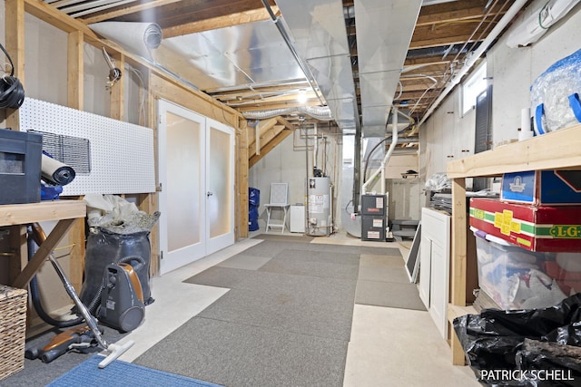 unfinished basement with water heater and heating unit