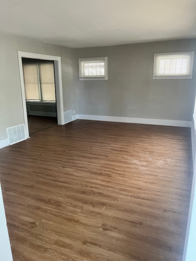 27305 Norfolk St, Inkster, MI 48141 - empty room featuring wood finished floors and baseboards