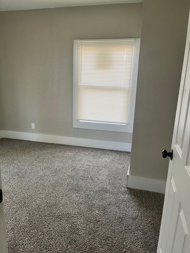 27305 Norfolk St, Inkster, MI 48141 - empty room featuring plenty of natural light, carpet, and baseboards