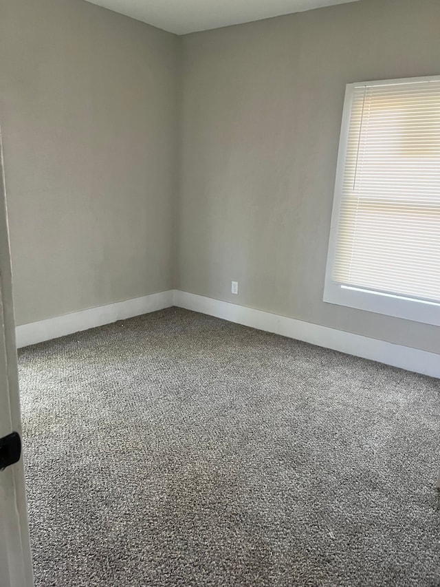 27305 Norfolk St, Inkster, MI 48141 - empty room with carpet flooring and baseboards
