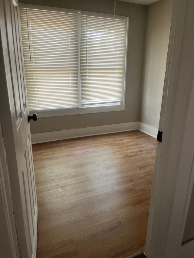 27305 Norfolk St, Inkster, MI 48141 - spare room featuring wood finished floors and baseboards