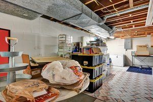 unfinished below grade area featuring electric panel