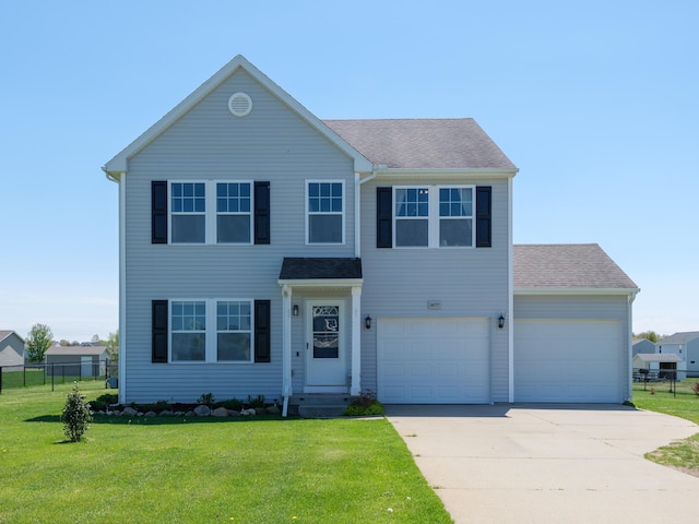 view of front of home featuring driveway and roof with shingles
