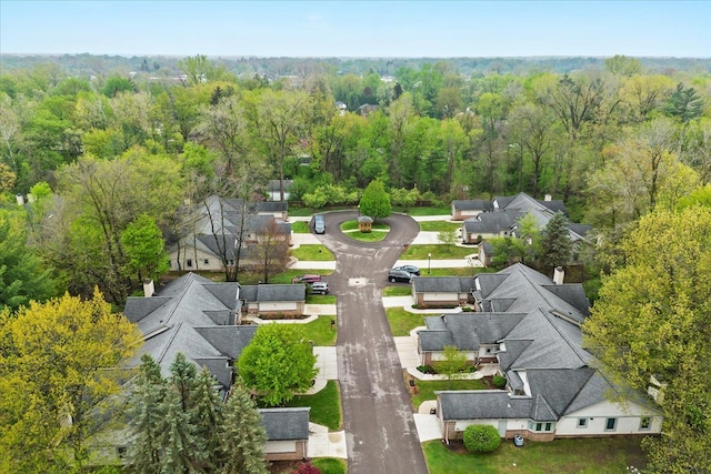 aerial view of residential area with a forest