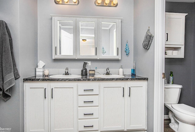 39500 Warren Rd, Canton, MI 48187 - bathroom with double vanity and toilet