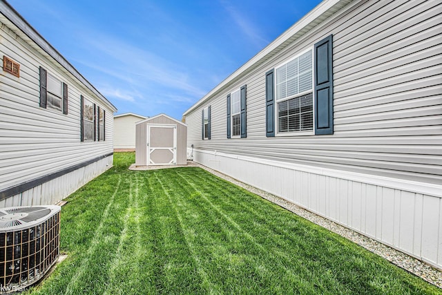 39500 Warren Rd, Canton, MI 48187 - view of green lawn with a storage unit