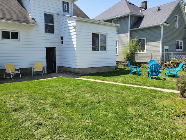 625 Leonard St NE, Grand Rapids, MI 49503 - back of property with a shingled roof