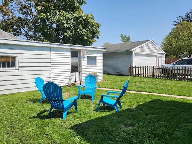 625 Leonard St NE, Grand Rapids, MI 49503 - view of yard with a garage and an outbuilding