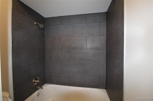 full bathroom with shower / tub combination and toilet