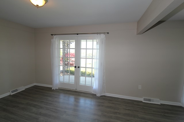 entryway featuring french doors, dark wood finished floors, and baseboards