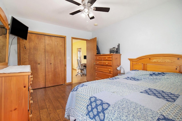 185 S Madison Ave, Custer, MI 49405 - bedroom featuring wood-type flooring, a closet, and a ceiling fan