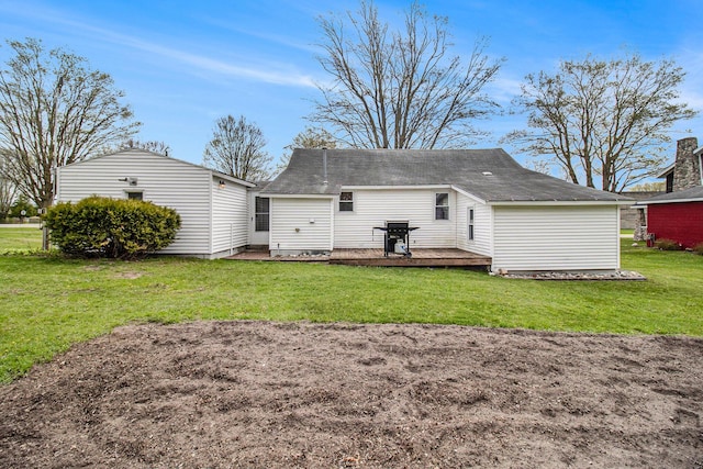 185 S Madison Ave, Custer, MI 49405 - rear view of property with a wooden deck and a yard