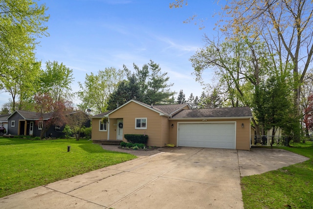 view of front of home featuring a garage, concrete driveway, and a front yard