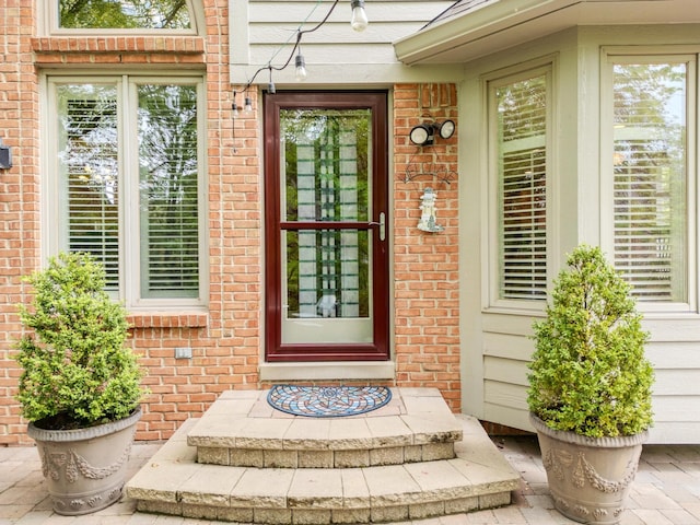 28022 Ashland Ave, Harrison Township, MI 48045 - doorway to property featuring brick siding