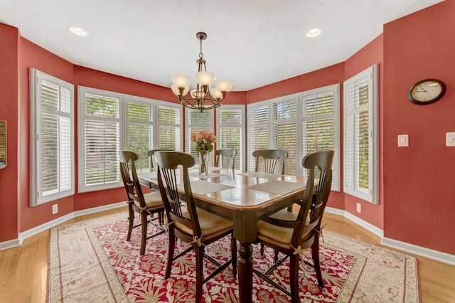 28022 Ashland Ave, Harrison Township, MI 48045 - dining area with a chandelier, light wood-style flooring, baseboards, and recessed lighting