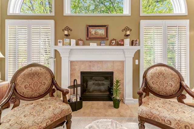 28022 Ashland Ave, Harrison Township, MI 48045 - living area with healthy amount of natural light, tile patterned flooring, a tile fireplace, and a high ceiling