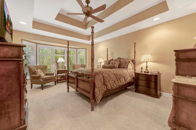 28022 Ashland Ave, Harrison Township, MI 48045 - bedroom featuring light colored carpet, a raised ceiling, a ceiling fan, baseboards, and recessed lighting