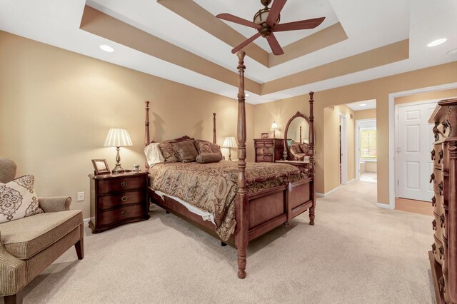 28022 Ashland Ave, Harrison Township, MI 48045 - bedroom featuring light carpet, a tray ceiling, baseboards, recessed lighting, and a ceiling fan