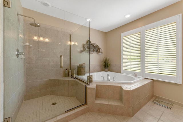 28022 Ashland Ave, Harrison Township, MI 48045 - full bath featuring tile patterned flooring, a shower stall, and a garden tub