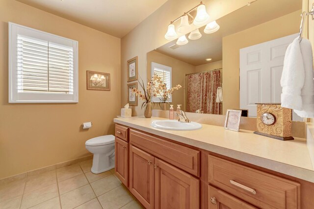 28022 Ashland Ave, Harrison Township, MI 48045 - bathroom with tile patterned flooring, toilet, baseboards, vanity, and curtained shower