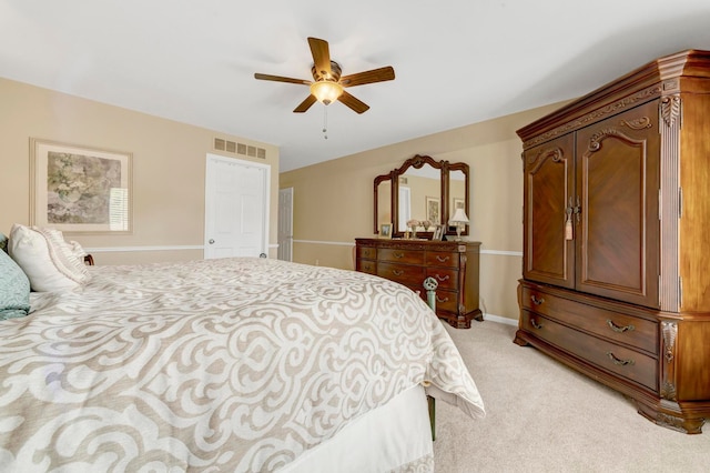 28022 Ashland Ave, Harrison Township, MI 48045 - bedroom with light colored carpet, a ceiling fan, and baseboards