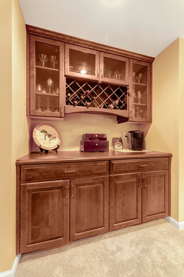 28022 Ashland Ave, Harrison Township, MI 48045 - indoor dry bar featuring baseboards and light carpet