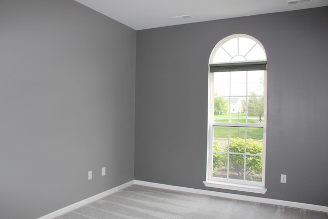 9541 Lakeside Dr, Ypsilanti, MI 48197 - carpeted spare room featuring plenty of natural light and baseboards