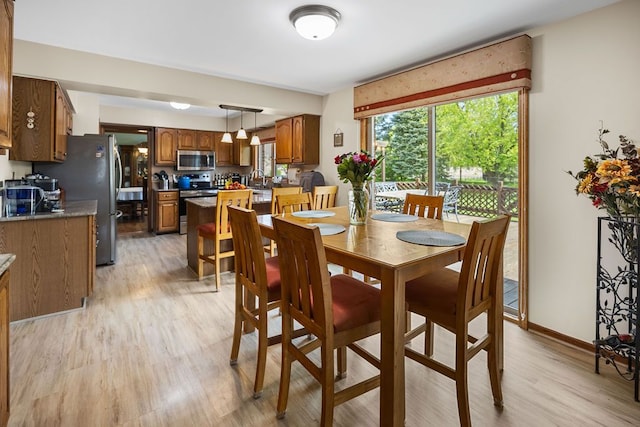 34570 Navin Ct, Livonia, MI 48152 - dining space with light wood-type flooring