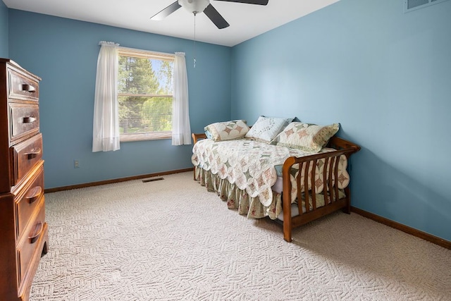 34570 Navin Ct, Livonia, MI 48152 - bedroom with light carpet, baseboards, and ceiling fan