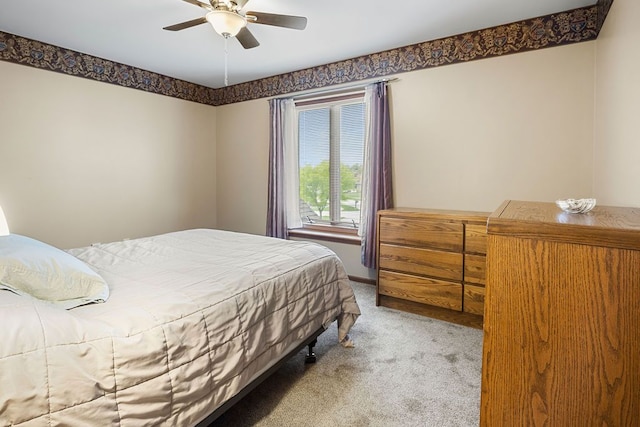 34570 Navin Ct, Livonia, MI 48152 - bedroom with light colored carpet, ceiling fan, and baseboards