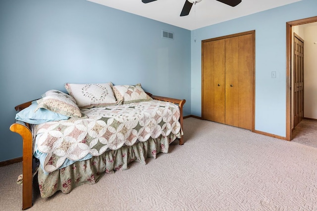 34570 Navin Ct, Livonia, MI 48152 - bedroom with baseboards, carpet, a closet, and ceiling fan