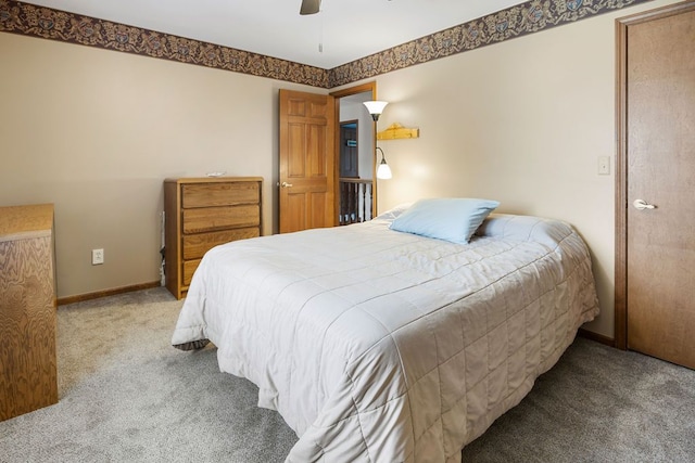 34570 Navin Ct, Livonia, MI 48152 - carpeted bedroom with a ceiling fan and baseboards