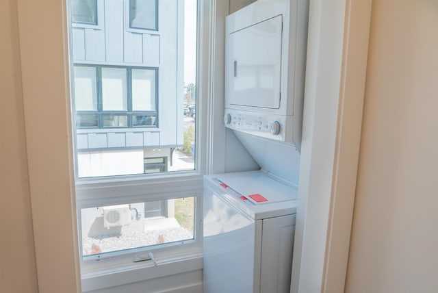 138 Gillis St, Traverse City, MI 49684 - washroom featuring stacked washer / drying machine