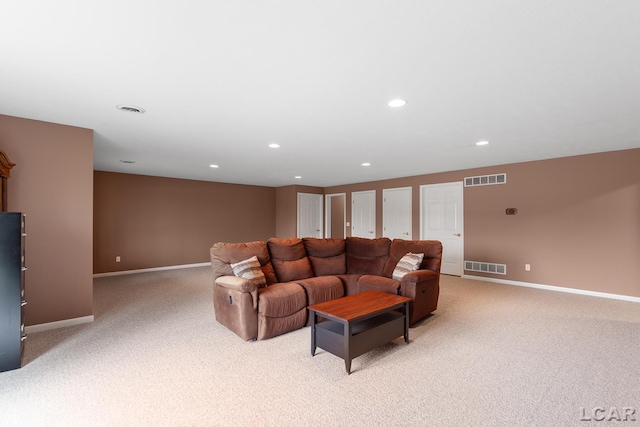 living area with light colored carpet, baseboards, and recessed lighting